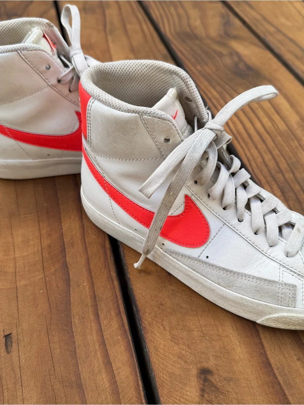 Nike High-Top Sneakers in Cream with Neon Orange Swoosh